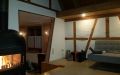 Wohnzimmer mit Holzofen